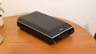 Epson Perfection V600 Photo flatbed scanner on a wooden table