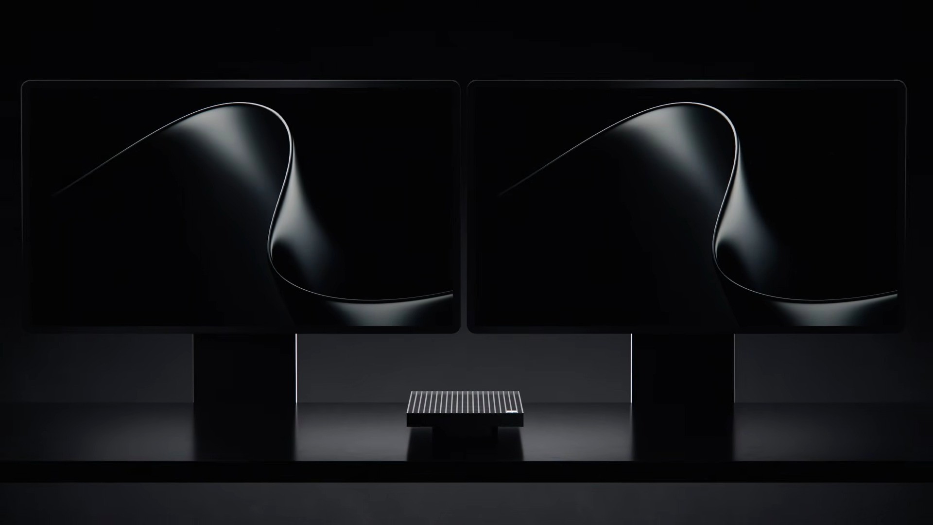 Renders of the Microsoft Surface RTX Spark Dev Box showing the design, the Microsoft logo, and dual monitors performing different tasks.