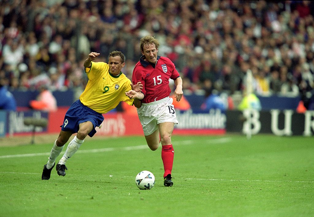 28 May 2000: Ray Parlour of England holds off Franca of Brazil during the International Friendly match at Wembley Stadium in London. The match was drawn 1-1. \ Mandatory Credit: Gary M Prior/Allsport