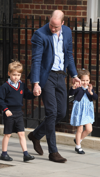 Prince William, Duke of Cambridge arrives with Prince George and Princess Charlotte at the Lindo Wing after Catherine, Duchess of Cambridge gave birth to their son at St Mary's Hospital on April 23, 2018 in London, England