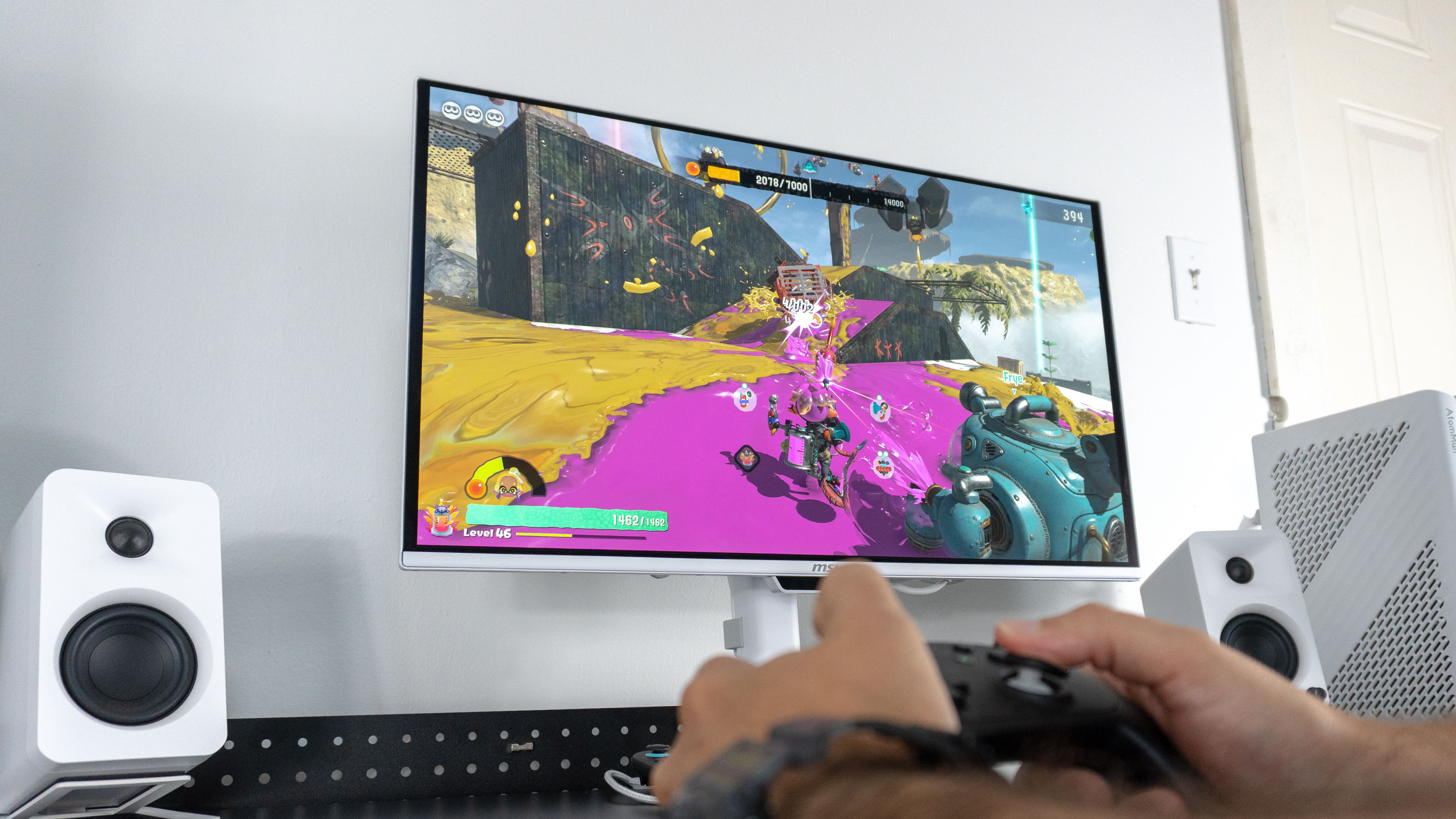 A person playing Splatoon Raiders on the Nintendo Switch 2 on the MSI Pro Max 271UPXW12G monitor