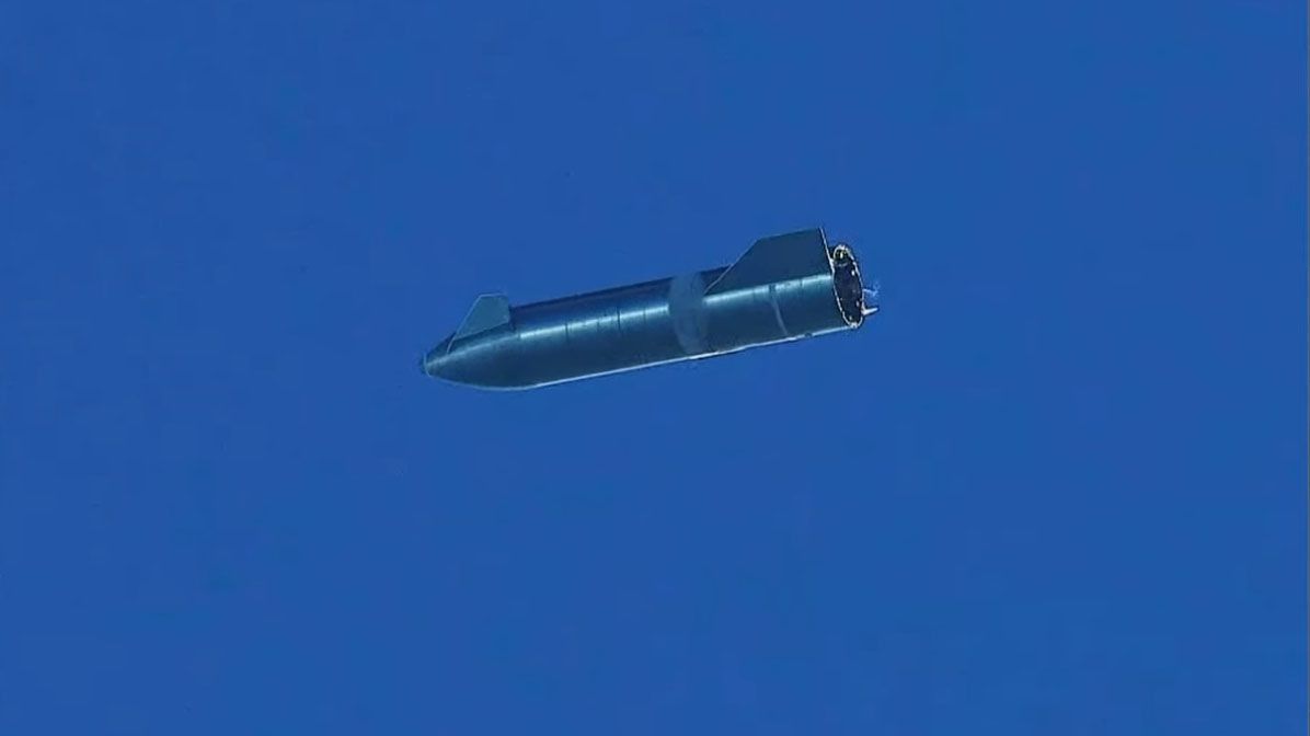 SpaceX's Starship SN8 prototype glides back to Earth to attempt a landing during its first high-altitude test flight from its Boca Chica, Texas test site on Dec. 9, 2020.