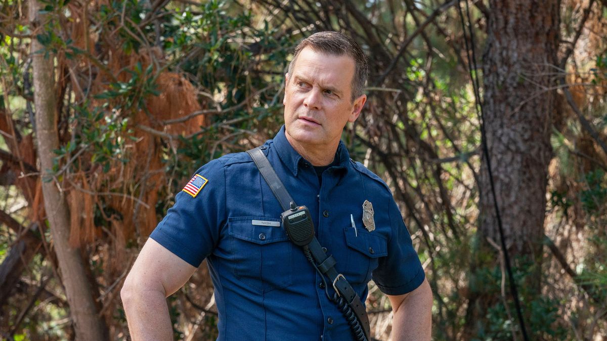 Peter Krause as Bobby Nash, looking concerned, in a 9-1-1 season 6 episode photo