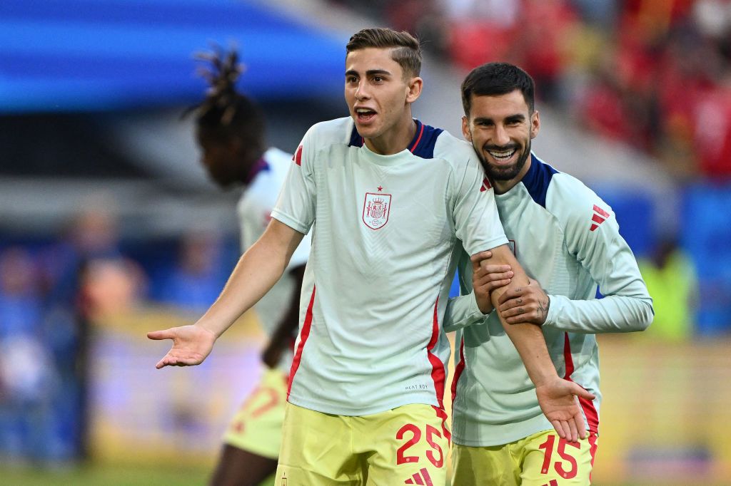 Spain 2024 Olympics squad Spain&#039;s forward #25 Fermin Lopez and Spain&#039;s midfielder #15 Alex Baena warm up ahead of the UEFA Euro 2024 Group B football match between Albania and Spain at the Duesseldorf Arena in Duesseldorf on June 24, 2024. (Photo by PATRICIA DE MELO MOREIRA / AFP) (Photo by PATRICIA DE MELO MOREIRA/AFP via Getty Images)