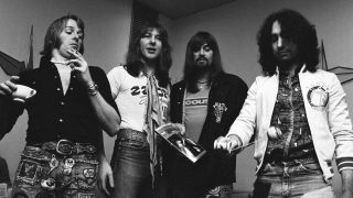 Bad Company pose backstage in Japan, 1975
