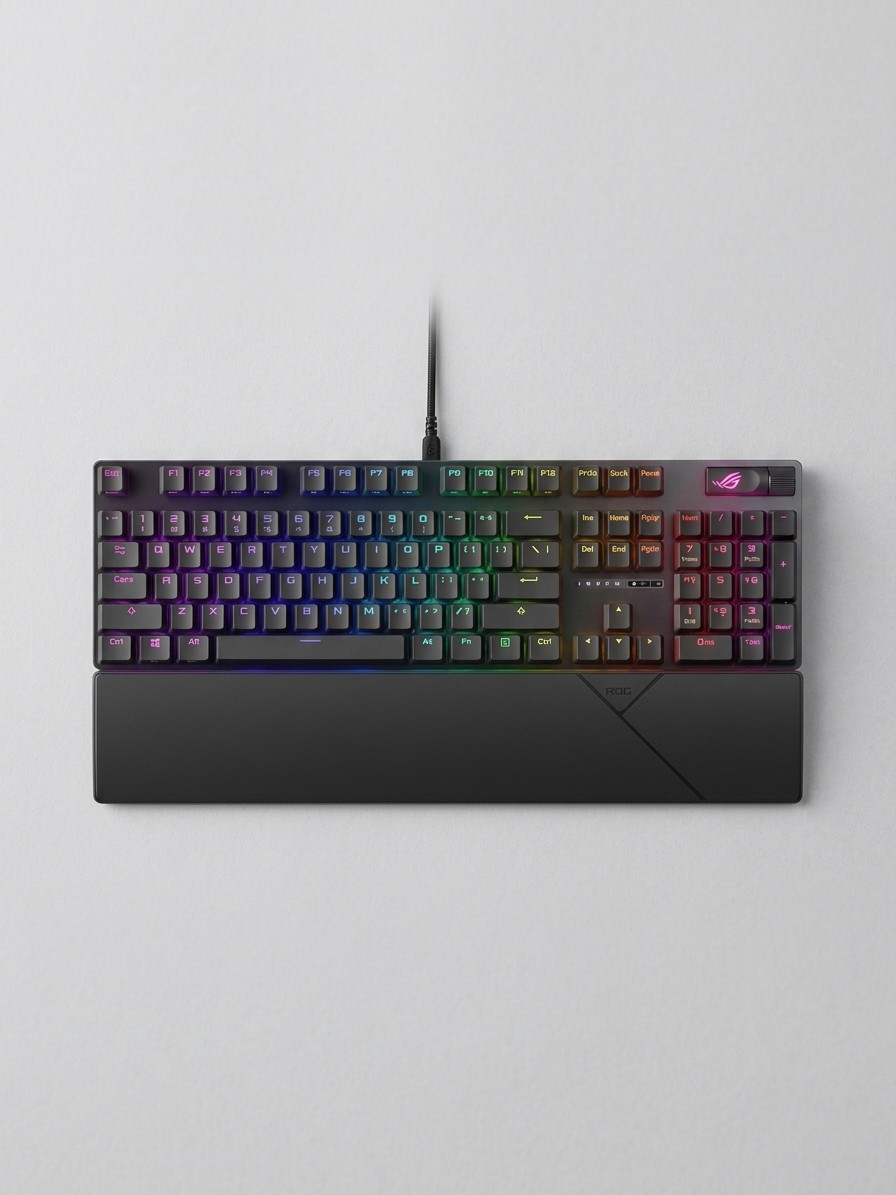 An Asus ROG Strix Scope II wired gaming keyboard lit up in RGB