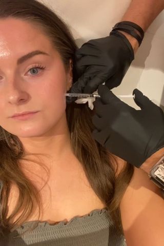Tori Crowther receiving Masseter Botox