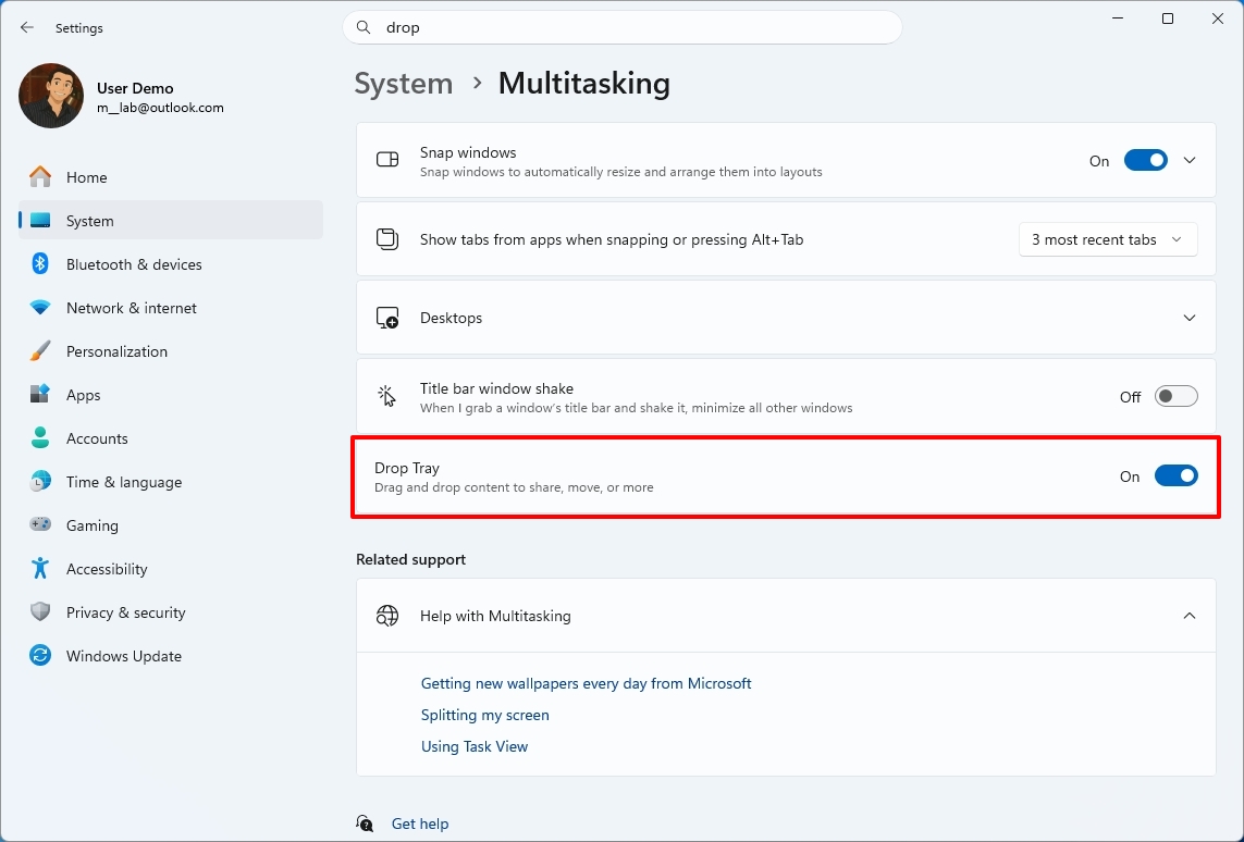 Windows 11 Settings Drop Tray feature.