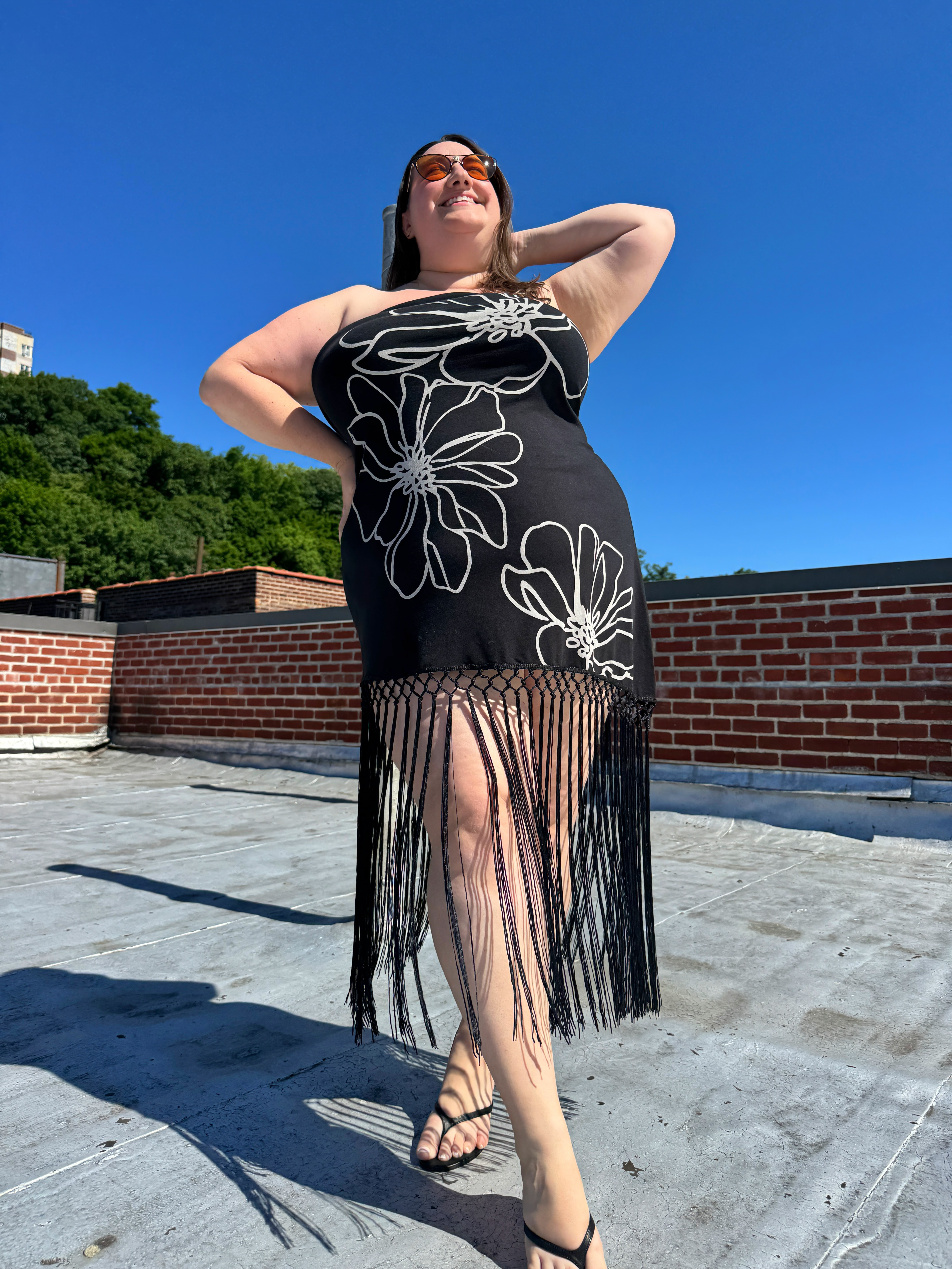 Sarah Chiwaya posing in vacation outfit