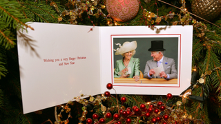 The Christmas card of Prince Charles, Prince of Wales and Camilla, Duchess of Cornwall featuring a photograph of The Prince of Wales and The Duchess of Cornwall on the second day of Royal Ascot on June 19, 2013 taken by Stephen Lock / i-Images is seen on December 18, 2013 in London, England