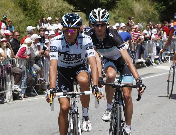 Andy Schleck and Alberto Contador head for the podium on the Alpe d'Huez