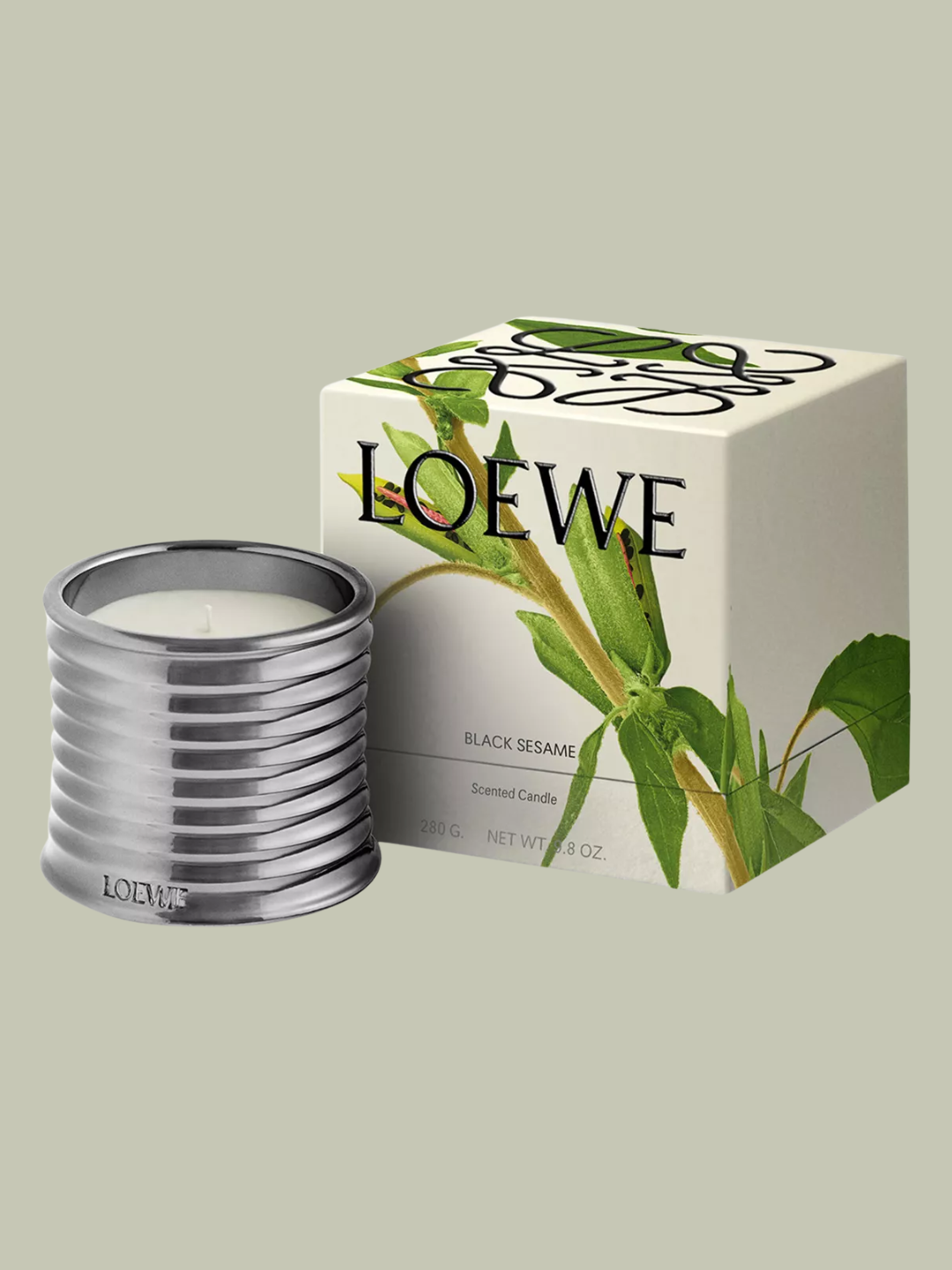 A silver ribbed black sesame scented candle from Loewe