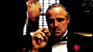 A screenshot of Marlon Brando being spoken to in The Godfather
