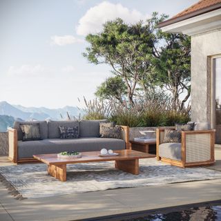 Wood and cane outdoor living set with sofa, armchair and coffee table