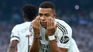 Kylian Mbappé of Real Madrid celebrates scoring his team's first goal during the LaLiga EA Sports match between Real Madrid CF and CA Osasuna at Estadio Santiago Bernabeu on August 19, 2025 in Madrid, Spain.