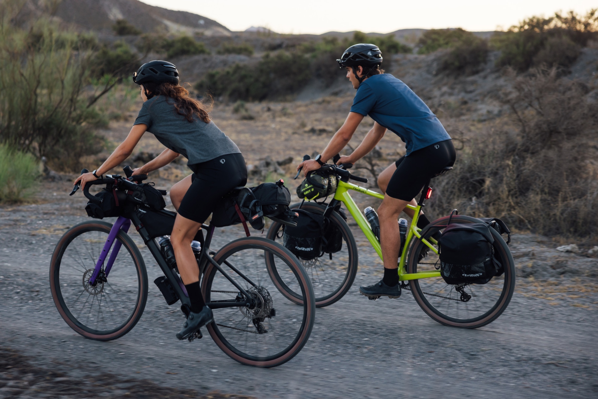 A woman and and a man riding Wilier Adlar bikes off-road