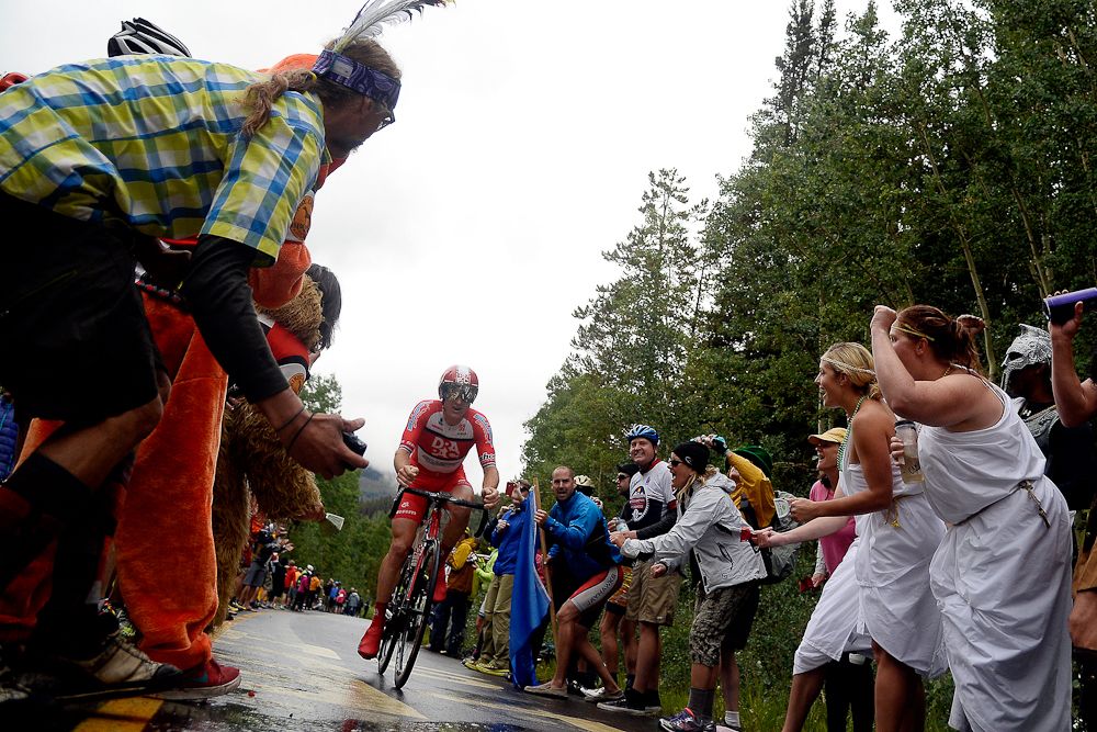 A rider makes his way through spectators at the Vail time trial during the USA Pro Challenge