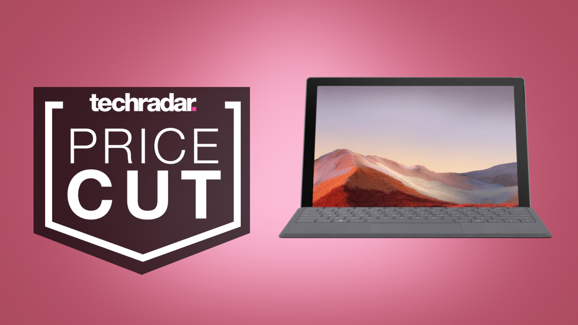 Surface Pro 7 dengan latar belakang merah muda