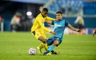 Borussia Dortmund's Youssoufa Moukoko (left) in action against Zenit St. Petersburg in the Champions League in December 2020.