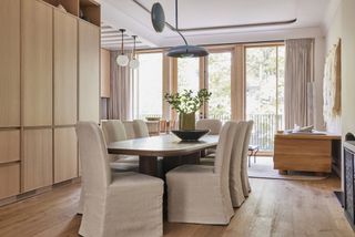 A dining room with streamlined storage