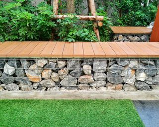 DIY gabion bench with wooden seating slats on top