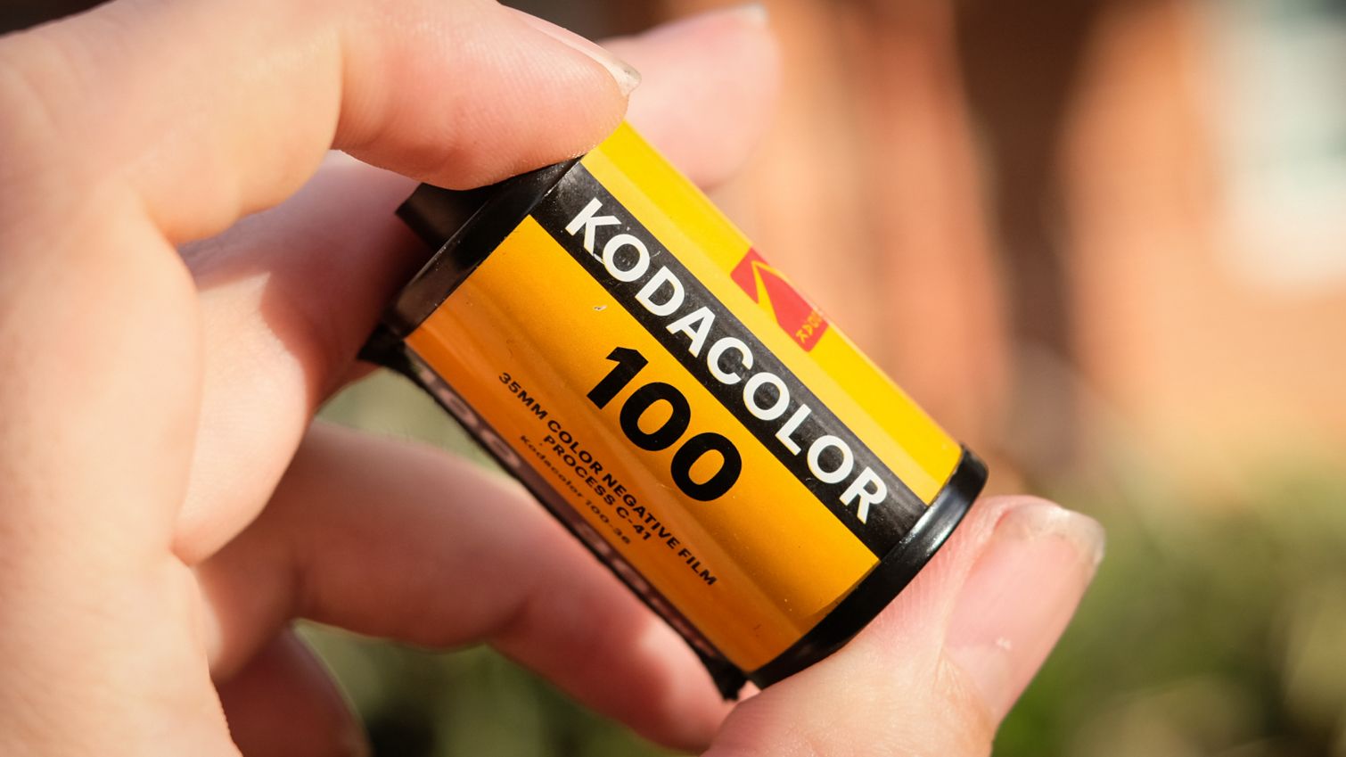 Roll of Kodak Kodacolor film held between person's finger and thumb