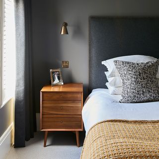 bedroom with beside table and headboard