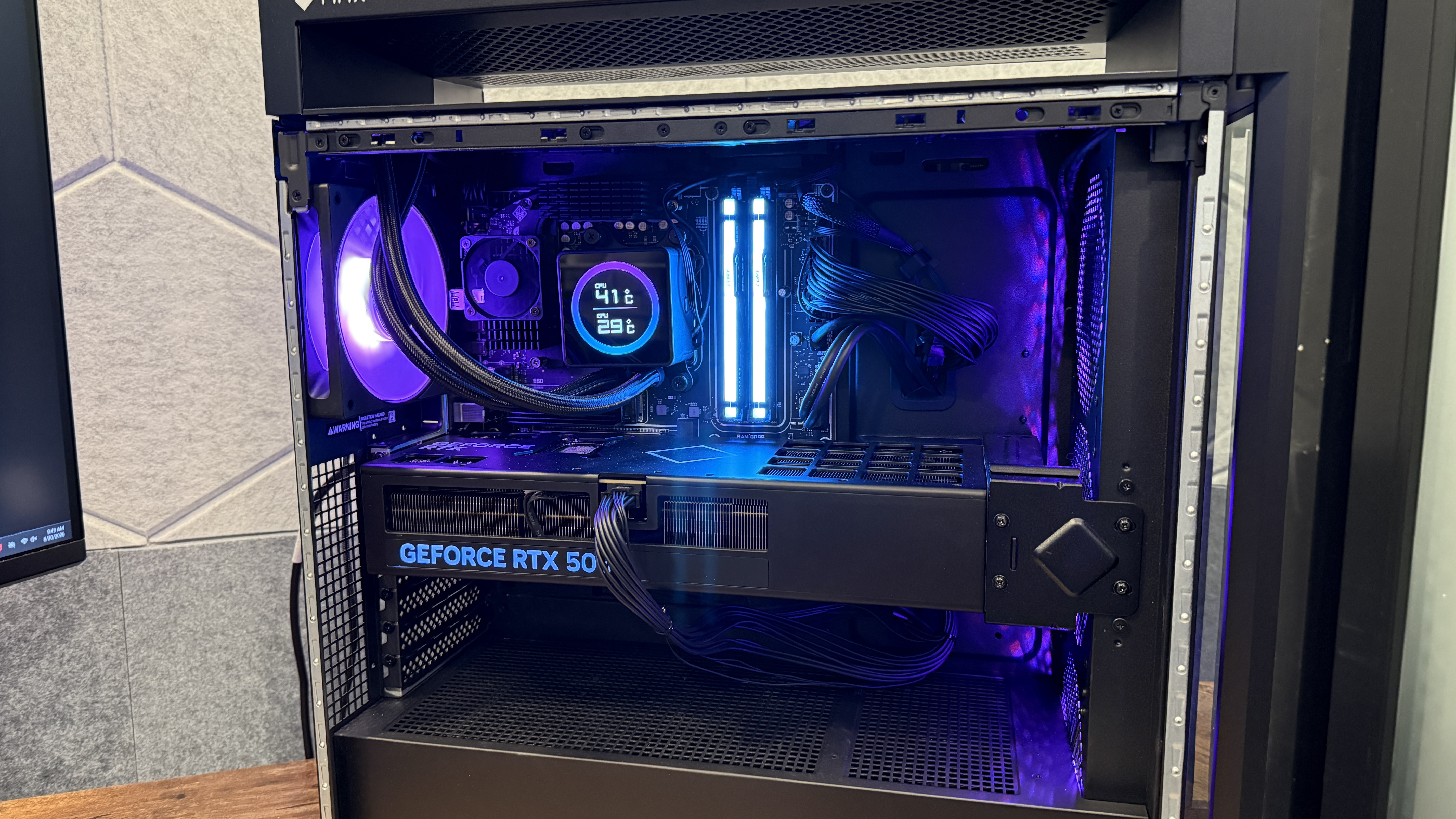 A close-up shot of the CPU cooler, graphics card and internal components of the HP Omen Max 45L