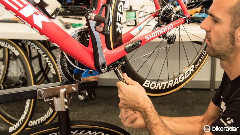 Adjusting the brake on a Trek Madone. Most Trek Factory Racing riders were actually on the Domane