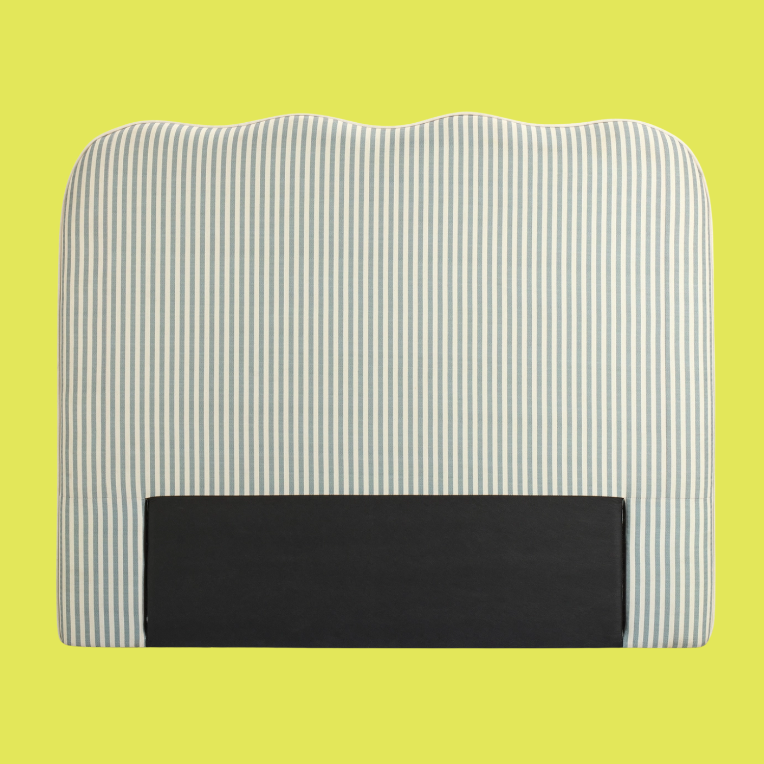 A green and white striped headboard