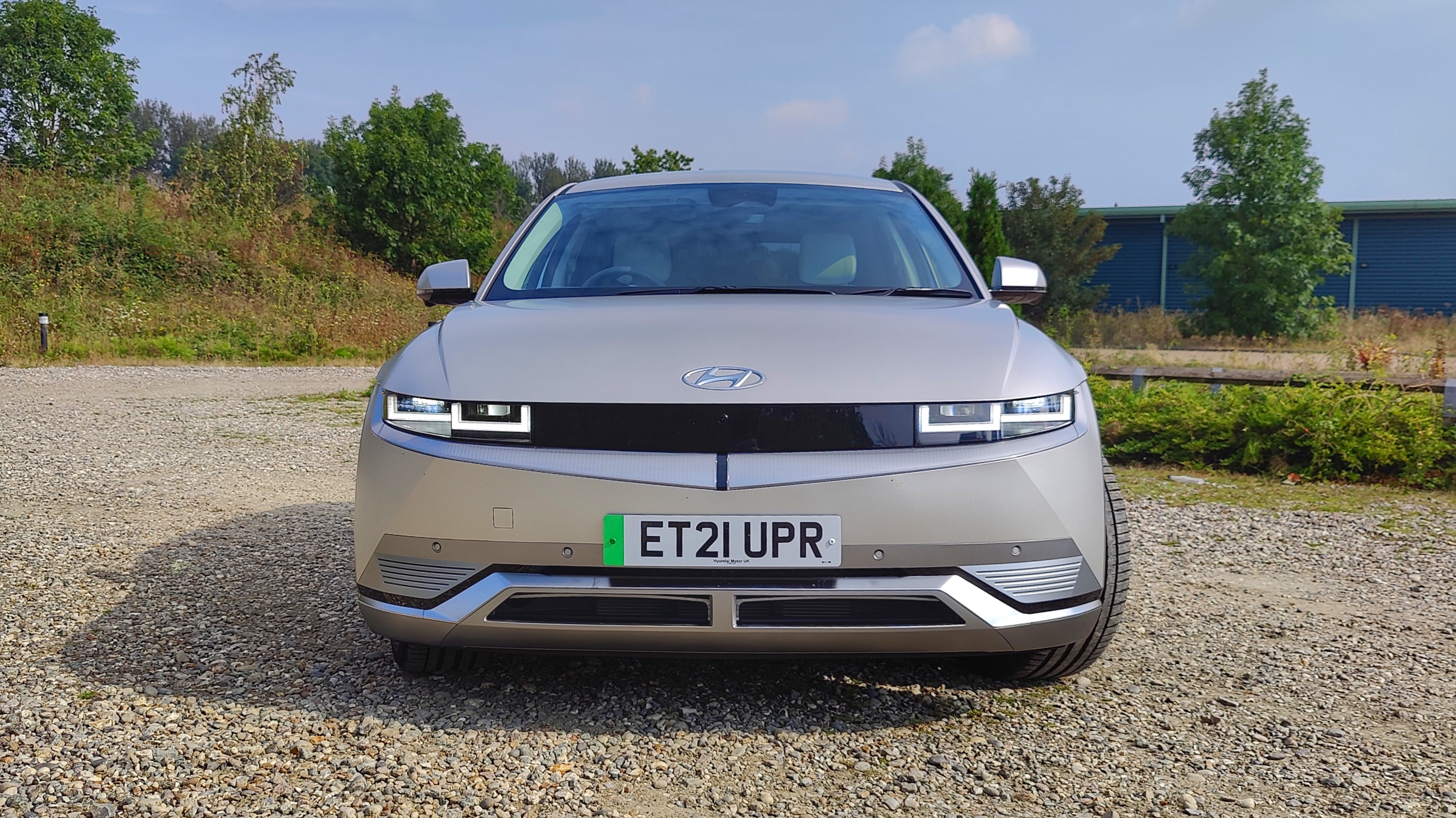 Front-on view of Ioniq in gravel parking lot