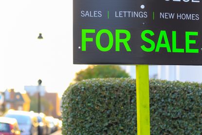 For Sale sign displayed on London street