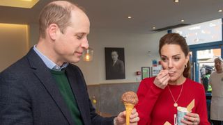 Prince William and Catherine, Princess of Wales eat ice cream during a visit to Joe's Ice Cream Parlour