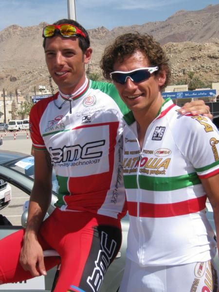 Ballan and Pozzato compare red and green jerseys