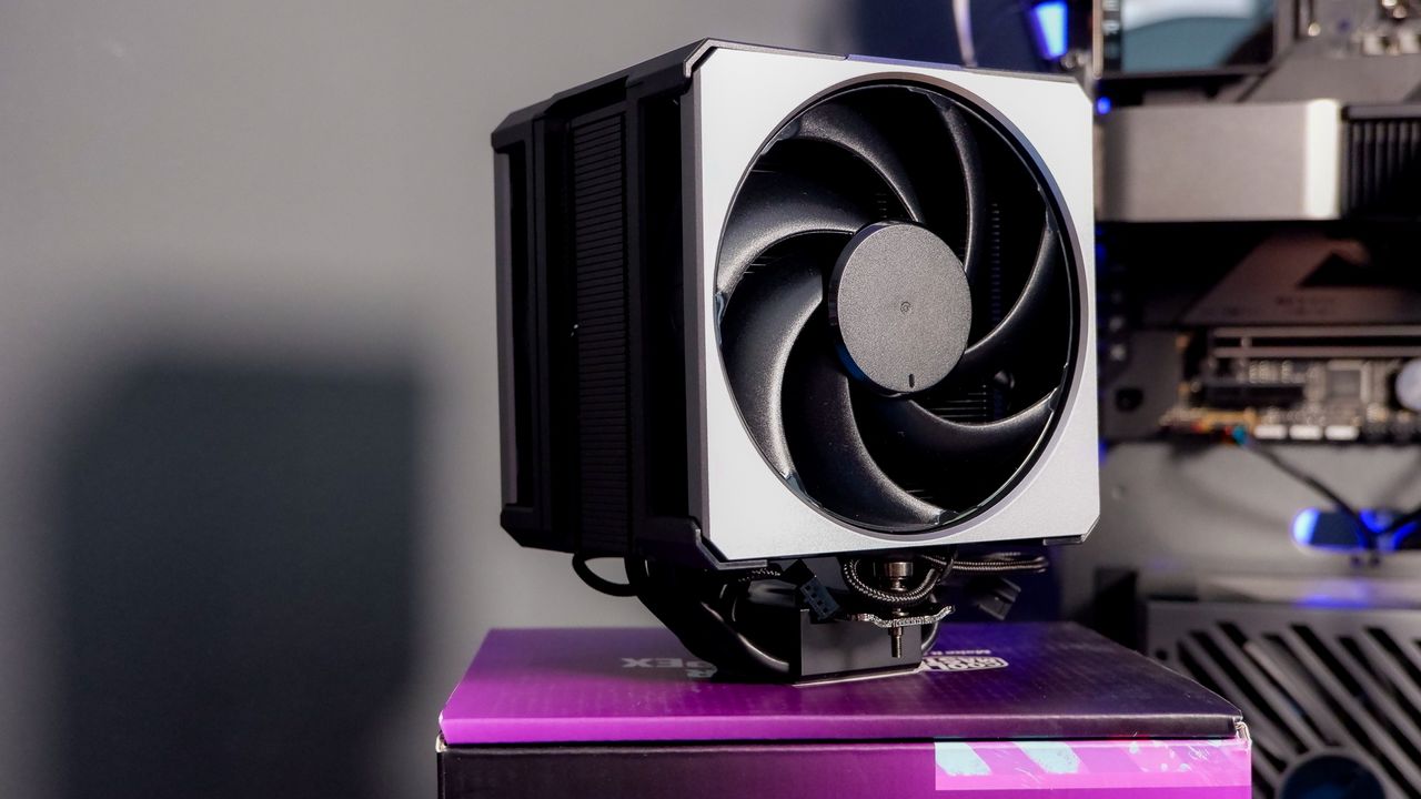 A Cooler Master Hyper 612 Apex on a desk and installed on a gaming PC.