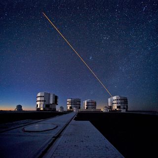 The ESO Very Large Telescope (VLT) during observations, using the Laser Guide Star (LGS) Adaptive Optics system, which allows astronomers to remove the effects of atmospheric turbulence.