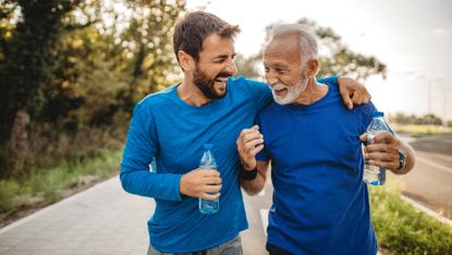 Two men outdoors exercising together