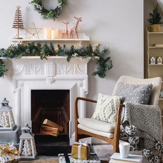 white fire pit white wall christmas decor and chair with cushions