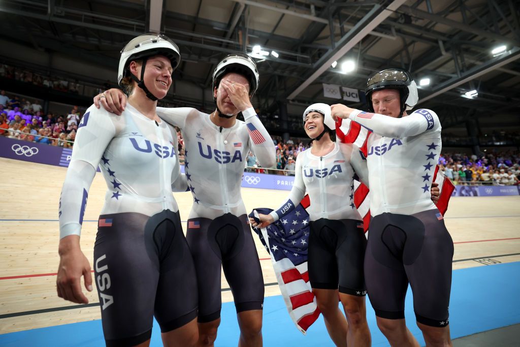 PARIS FRANCE AUGUST 07 Gold medalists Jennifer Valente Lily Williams Chloe Dygert and Kristen Faulkner of Team United States celebrate after the Womens Team Pursuit Finals on day twelve of the Olympic Games Paris 2024 at SaintQuentinenYvelines Velodrome on August 07 2024 in Paris France Photo by Jared C TiltonGetty Images