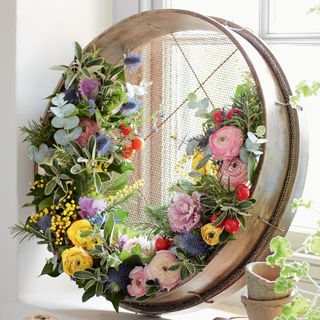 wooden sieve with flowers