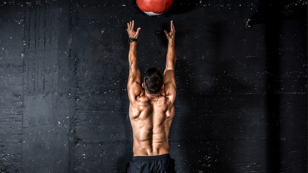 Man performing wall balls