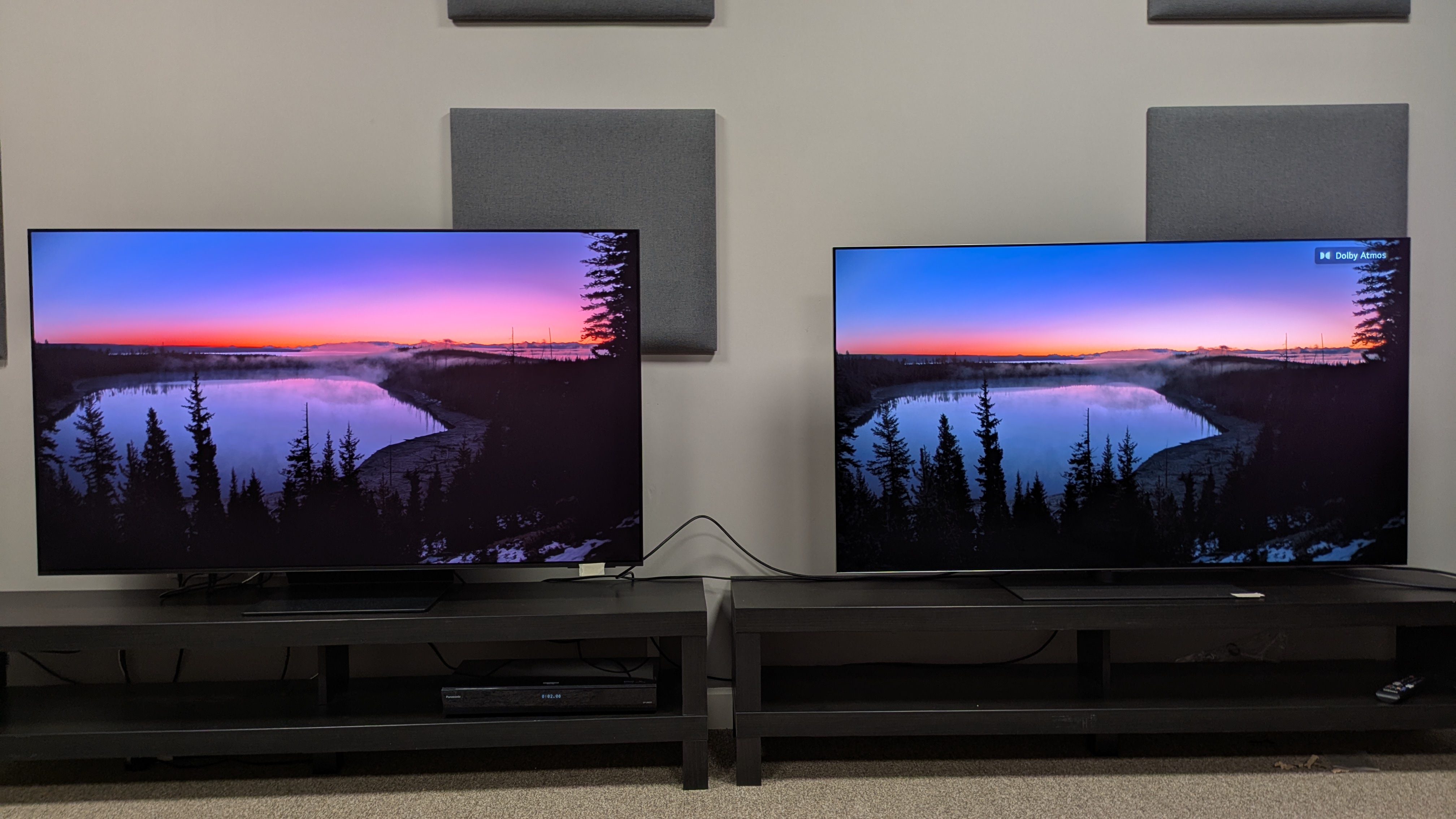Samsung S95f (left) vs LG G5 (right) showing sunset on screen