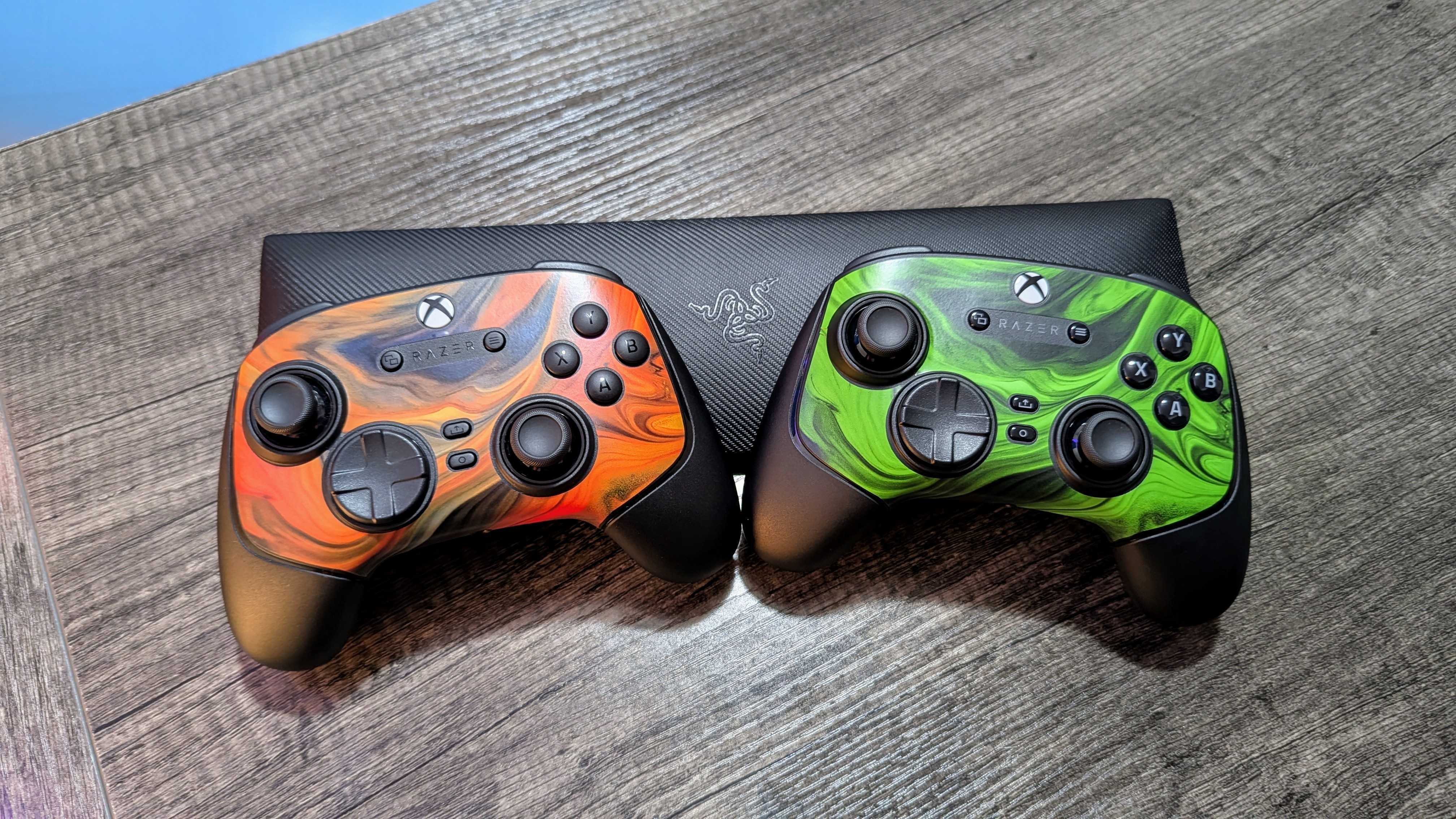 The Razer Wolverine V3 Tournament Edition sitting next to the Razer Wolverine V3 Pro.