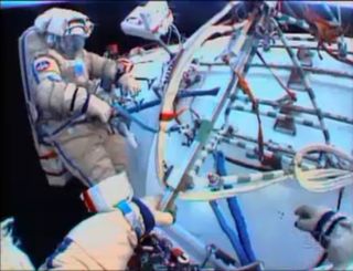 Russian cosmonauts Oleg Kotov and Sergey Ryazanskiy took a spacewalk outside the International Space Station on Dec. 27, 2013 to install commercial Earth observation cameras for the company UrtheCast and swap out experiments on the orbiting laboratory's h