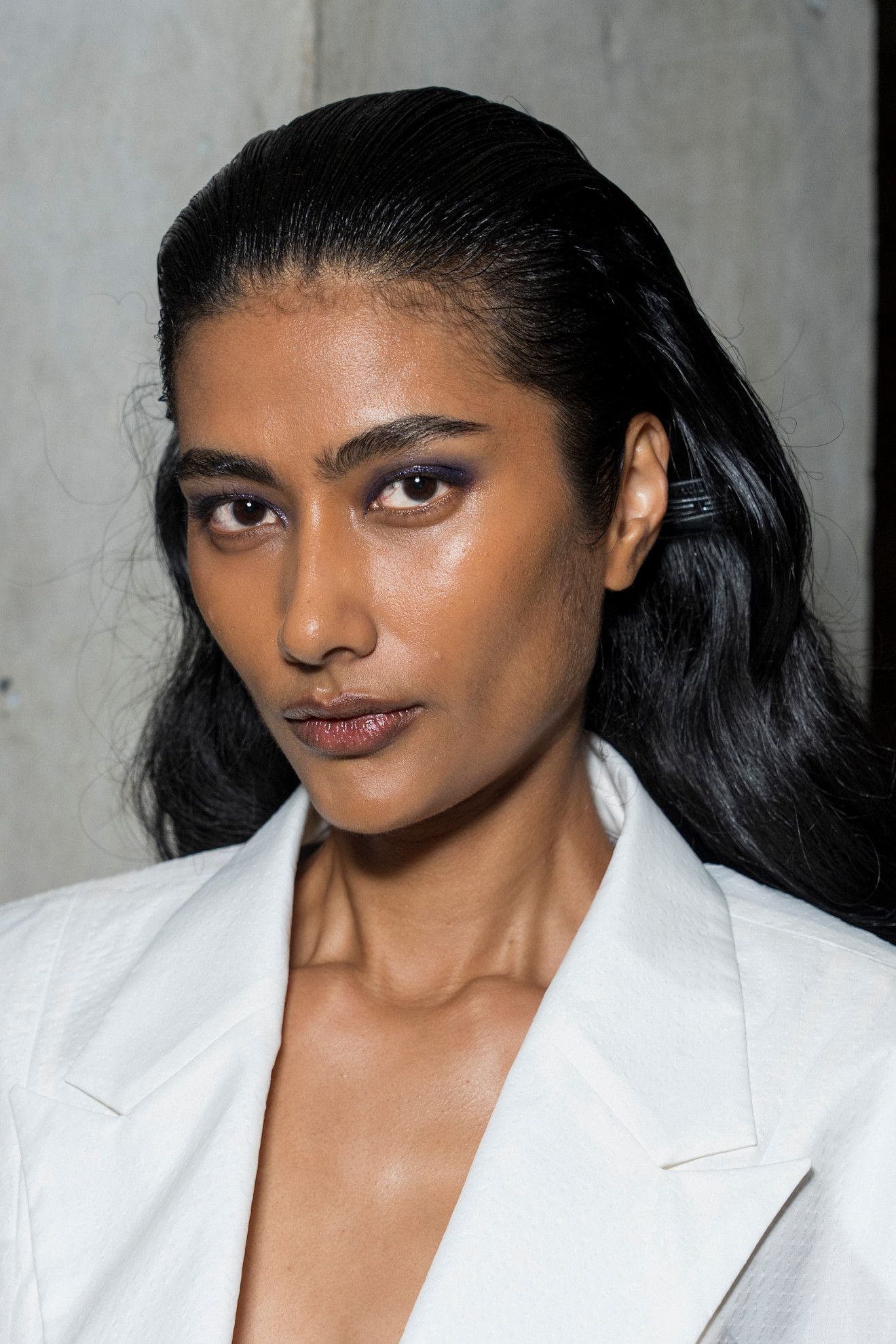 Various Women with deep, smokey eye makeup