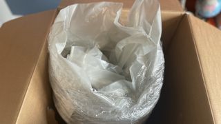 The Nectar Mattress photographed sat in the box it was delivered in, while still wrapped in vacuum sealed plastic