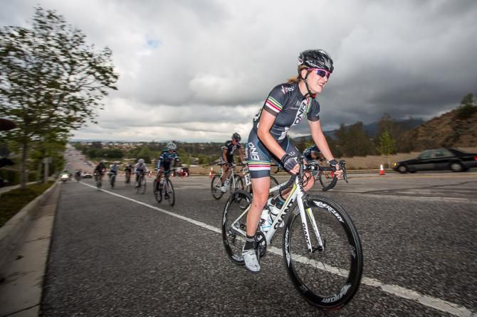 DNA rider leads a small group on the climb