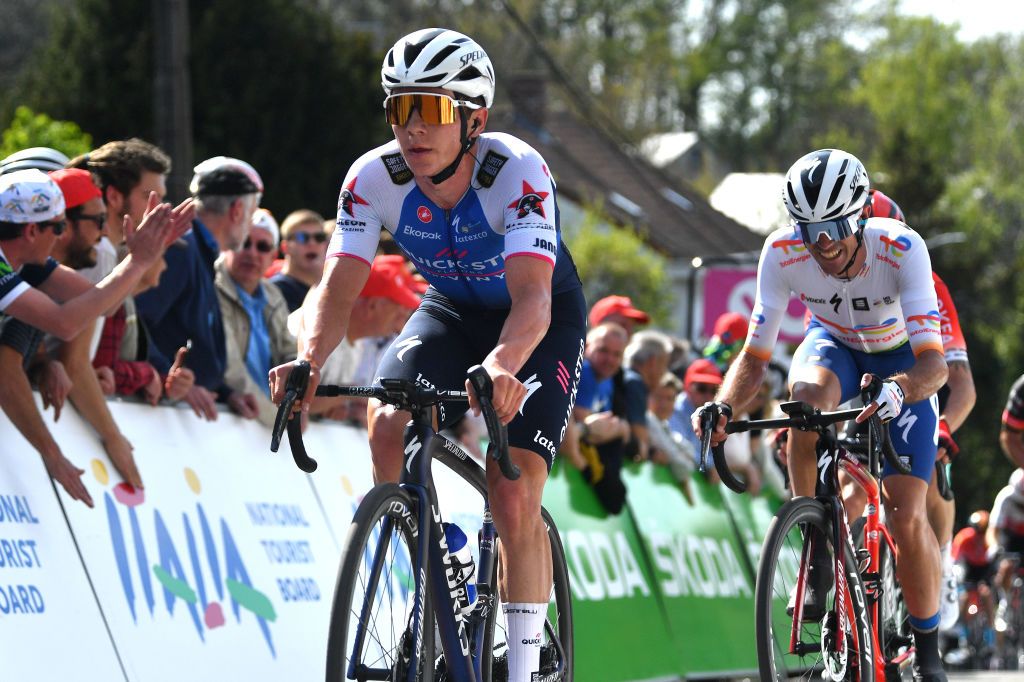 HUY BELGIUM APRIL 20 Remco Evenepoel of Belgium and Team QuickStep Alpha Vinyl crosses the finish line during the 86th La Flche Wallonne 2022 Mens Elite a 2011km one day race from Blegny to Mur de Huy 204m WorldTour FlecheWallonne on April 20 2022 in Huy Belgium Photo by Luc ClaessenGetty Images