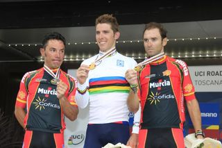 Tears on the podium for second-placed Joaquim Rodriguez (left) as Spanish national teammate Alejandro Valverde (right) remains unmoved