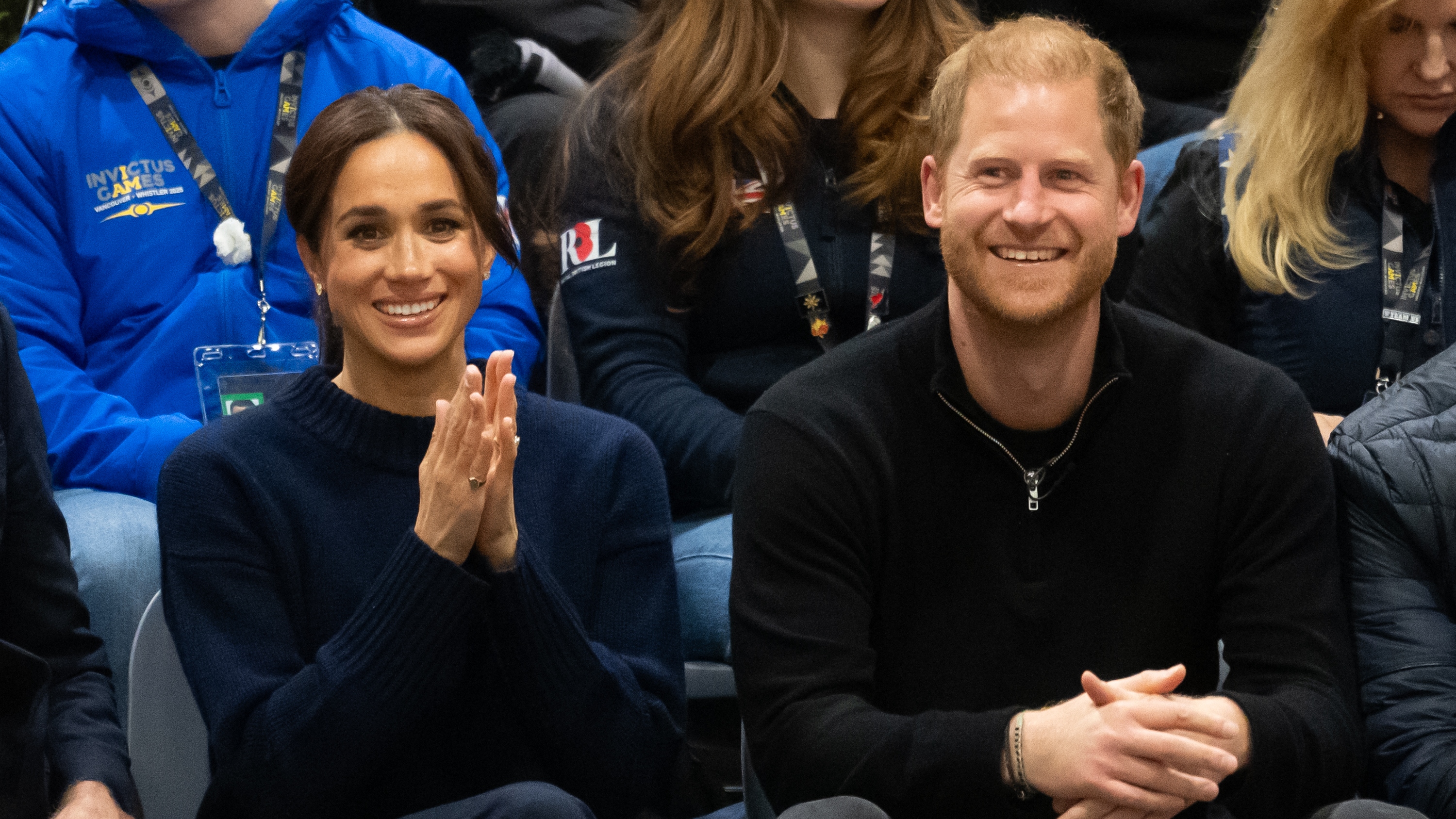 Prince Harry and Meghan, Duchess of Sussex smile as they watch the Wheelchair Basketball final between USA and Israel during day one of the 2025 Invictus Games